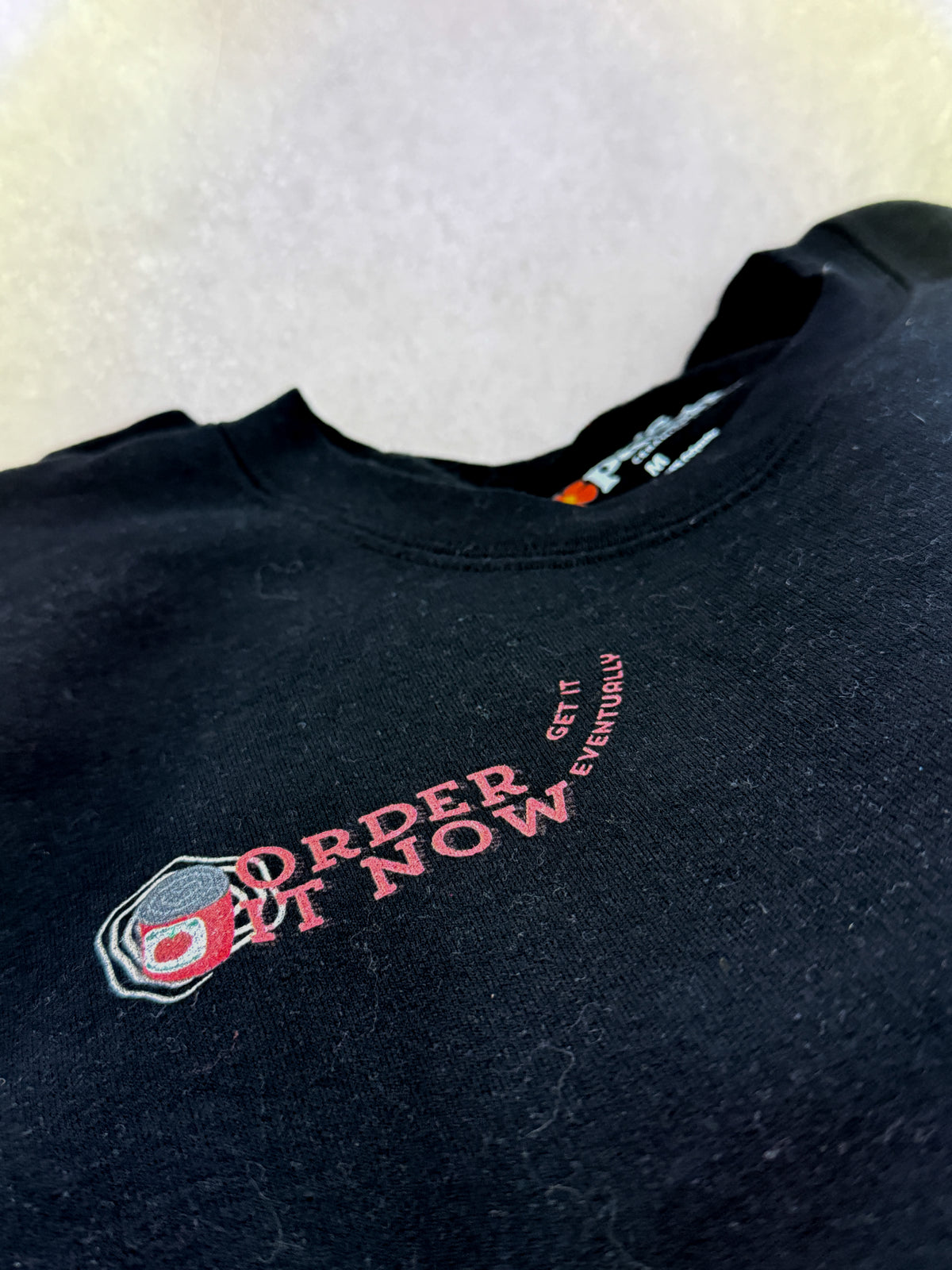 Souper Delivery Crewneck Sweatshirt — Retro Soup Can Logo & Hand-Drawn Snail, "Order It Now, Get It Eventually"